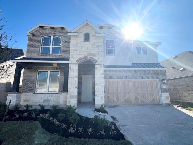 view of front of property featuring a garage