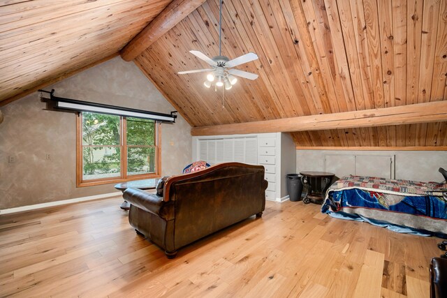 living room featuring vaulted ceiling with beams, ceiling fan, wood ceiling, and light hardwood / wood-style flooring