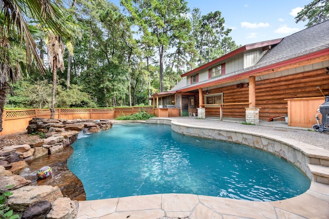 view of pool featuring pool water feature