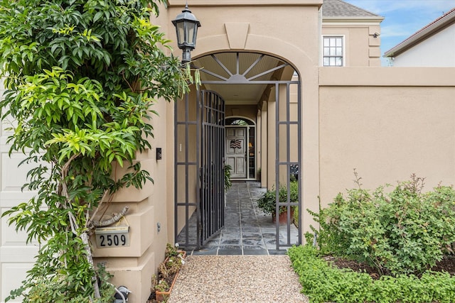 2509 Westgate Dr, Houston, TX 77019 - property entrance featuring stucco siding and roof with shingles