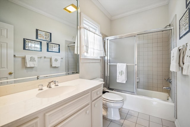 2509 Westgate Dr, Houston, TX 77019 - bathroom featuring tile patterned floors, vanity, shower / bath combination with glass door, and crown molding