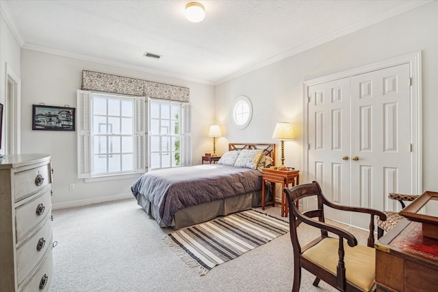 2509 Westgate Dr, Houston, TX 77019 - bedroom featuring light colored carpet, ornamental molding, and a closet