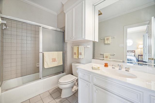 2509 Westgate Dr, Houston, TX 77019 - bathroom with ornamental molding, connected bathroom, vanity, tile patterned floors, and combined bath / shower with glass door