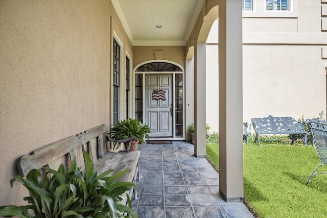 2509 Westgate Dr, Houston, TX 77019 - view of exterior entry with a yard and stucco siding