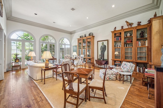 2509 Westgate Dr, Houston, TX 77019 - dining room with ornamental molding and light wood-style flooring