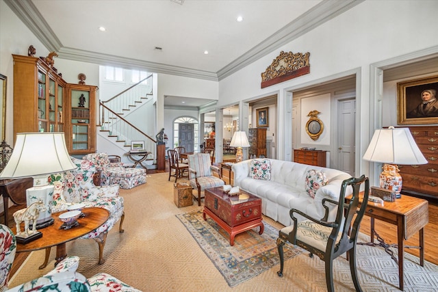 2509 Westgate Dr, Houston, TX 77019 - carpeted living area featuring ornamental molding, stairway, and recessed lighting