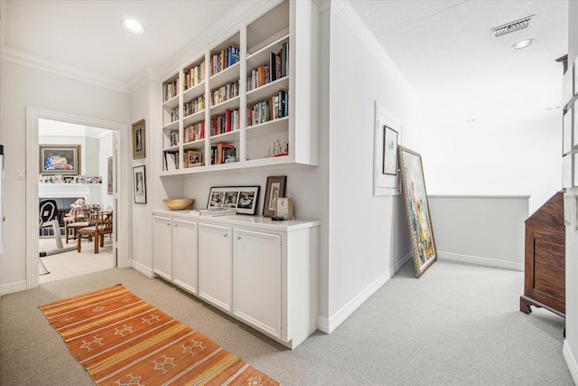 2509 Westgate Dr, Houston, TX 77019 - hall featuring light colored carpet, crown molding, and recessed lighting