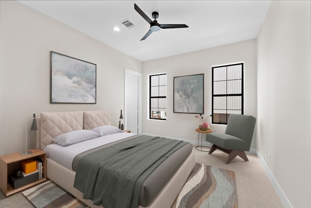 carpeted bedroom featuring ceiling fan