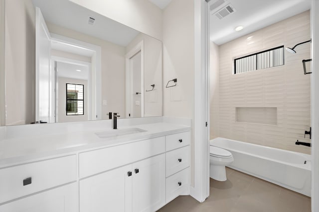 full bathroom with vanity, toilet, tile patterned floors, and bathing tub / shower combination