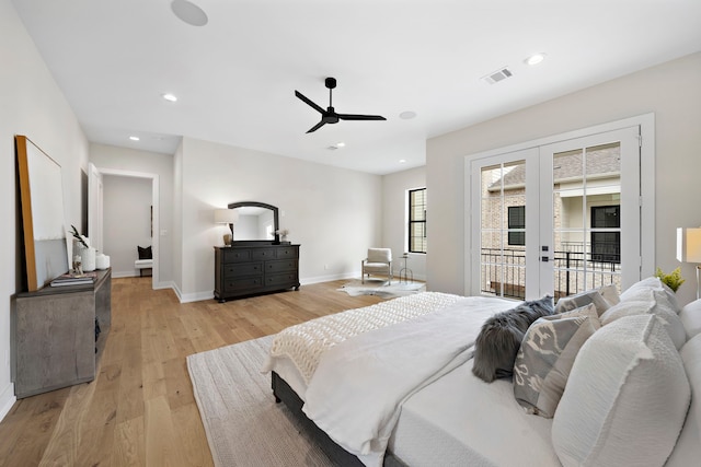 bedroom with light wood-type flooring, ceiling fan, access to exterior, and french doors