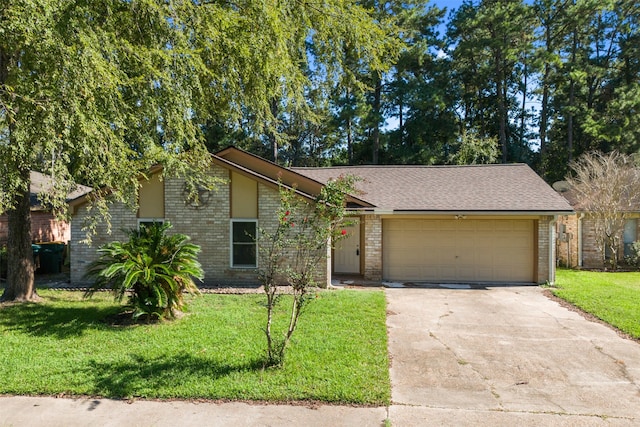 single story home featuring a front lawn and a garage