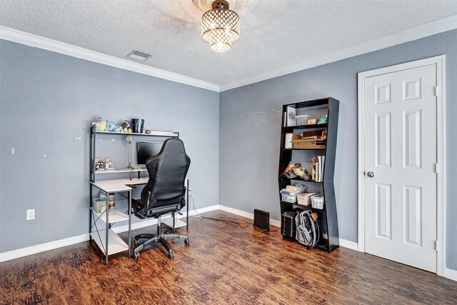 office area featuring a textured ceiling, dark wood-type flooring, and ornamental molding