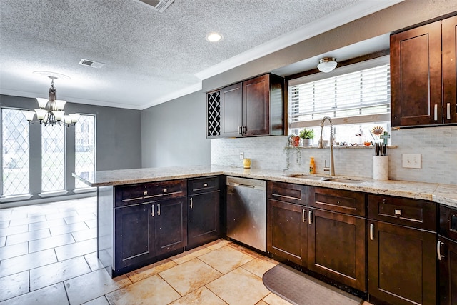 kitchen featuring decorative light fixtures, dishwasher, a notable chandelier, kitchen peninsula, and sink