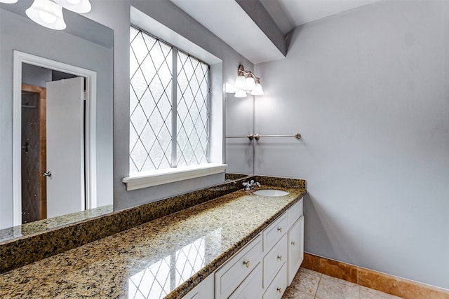 bathroom with vanity and tile patterned floors