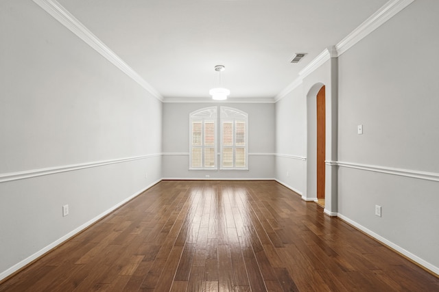 unfurnished room with crown molding and dark wood-type flooring