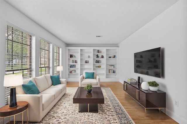 living room featuring light wood-type flooring