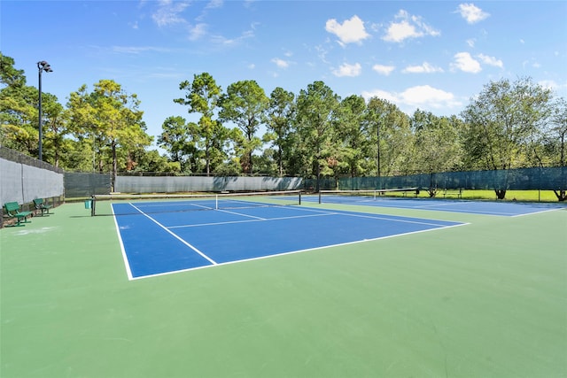 view of tennis court with basketball court