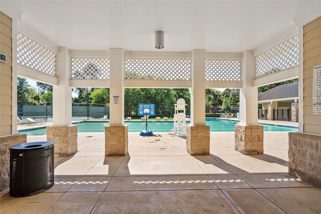 view of pool with a patio and central AC