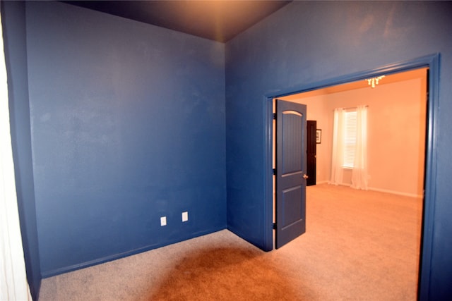 unfurnished room featuring carpet floors