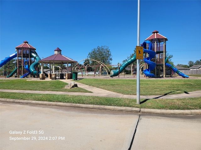 view of play area featuring a yard