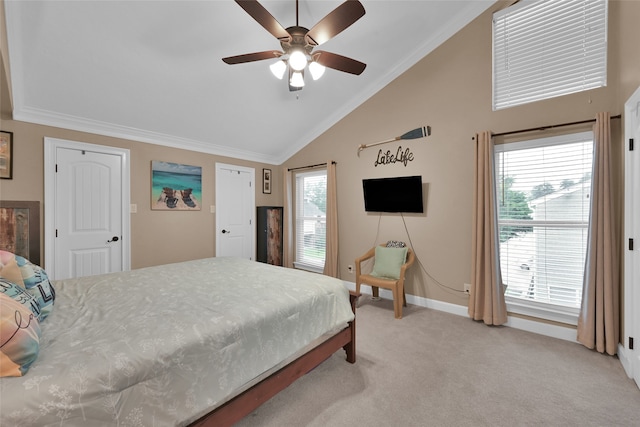 carpeted bedroom with high vaulted ceiling, ceiling fan, and ornamental molding