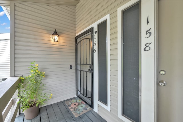 doorway to property with a porch