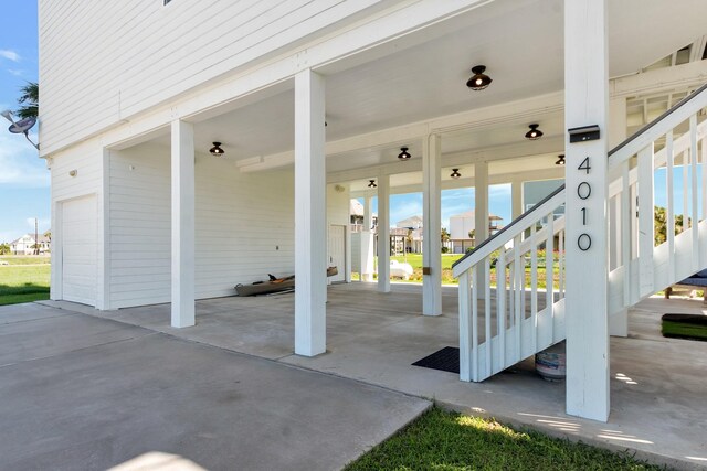 4010 Shallow Reef, Galveston, TX 77554 - view of patio with stairs
