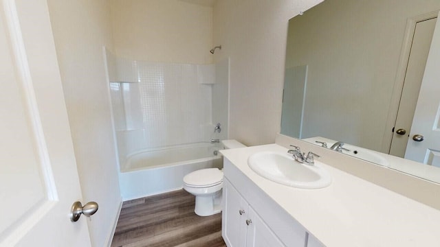 full bathroom featuring vanity, toilet, shower / tub combination, and hardwood / wood-style flooring