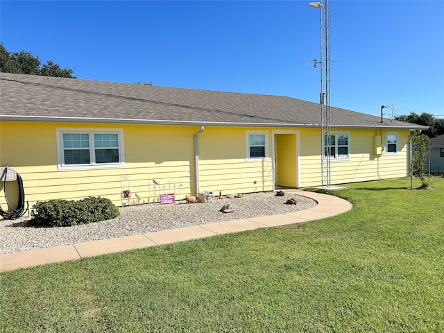 view of front of house with a front lawn