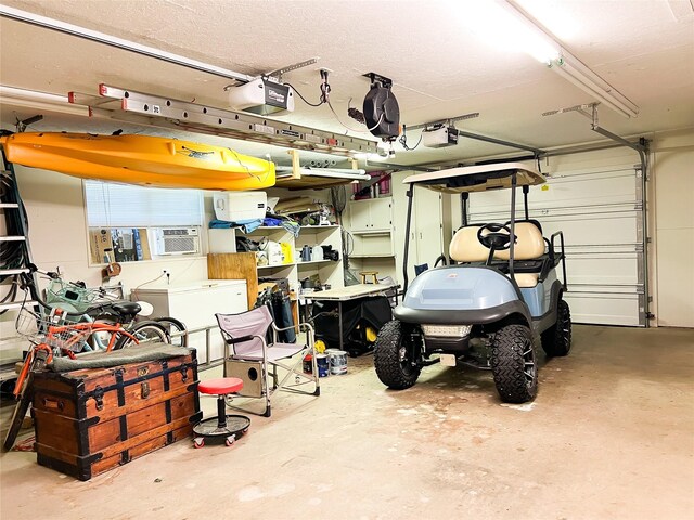1569 Lcr 822, Groesbeck, TX 76642 - garage featuring a garage door opener and cooling unit