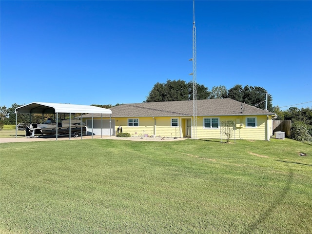 1569 Lcr 822, Groesbeck, TX 76642 - view of front of home featuring a detached carport and a front lawn