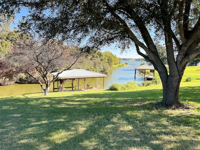 view of yard with a water view and a gazebo