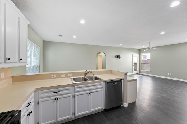 kitchen featuring white cabinetry, sink, ceiling fan, dark wood-type flooring, and stainless steel dishwasher