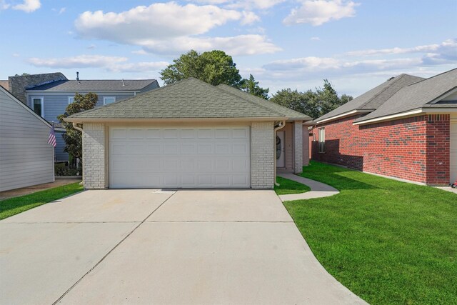 garage with a lawn