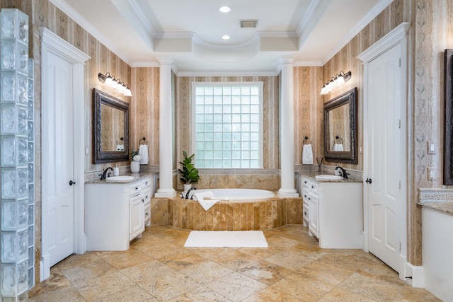 bathroom featuring crown molding, tiled bath, and vanity