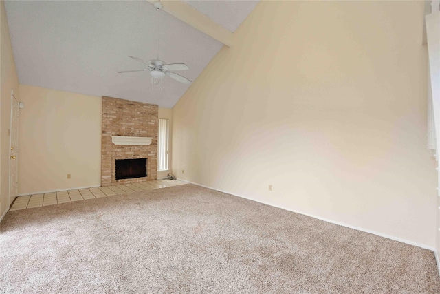 unfurnished living room with ceiling fan, a fireplace, carpet floors, and high vaulted ceiling