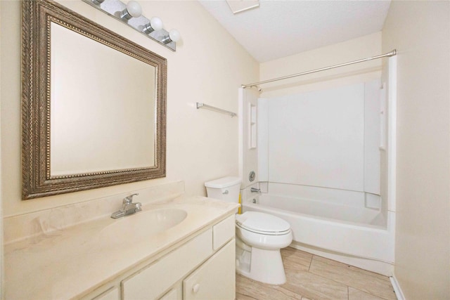 full bathroom with vanity, toilet, shower / tub combination, and a textured ceiling