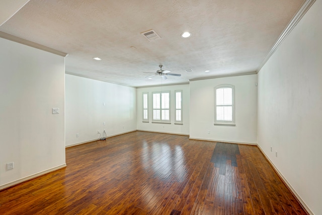 empty room featuring a textured ceiling, ceiling fan, ornamental molding, and hardwood / wood-style floors