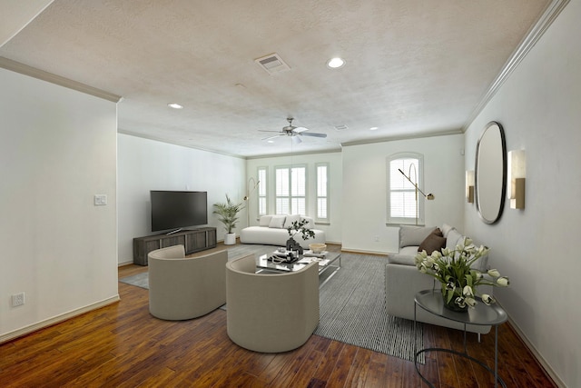 living room with crown molding, dark wood-type flooring, a textured ceiling, and ceiling fan