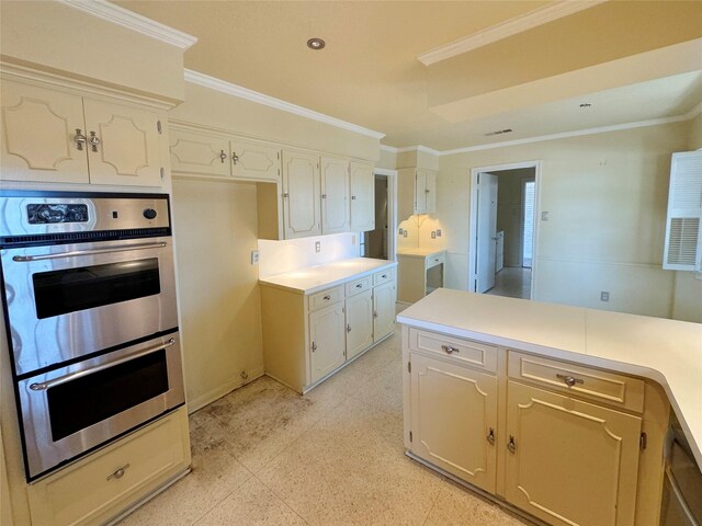 kitchen with crown molding and stainless steel double oven