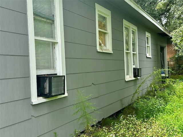 view of home's exterior with cooling unit