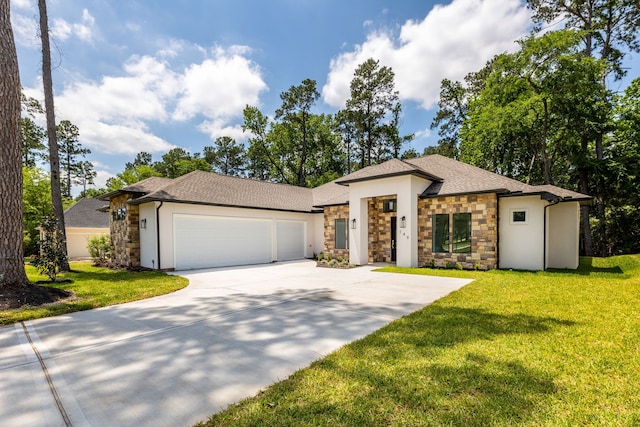 view of front facade featuring a garage and a front lawn