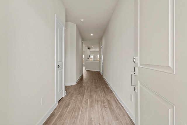 hall featuring light hardwood / wood-style floors