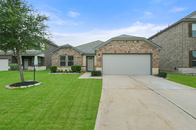 ranch-style house featuring a garage and a front yard