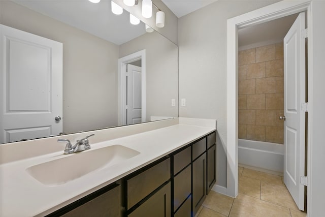 bathroom with tile patterned flooring and vanity