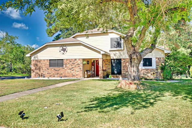 view of property with a front lawn