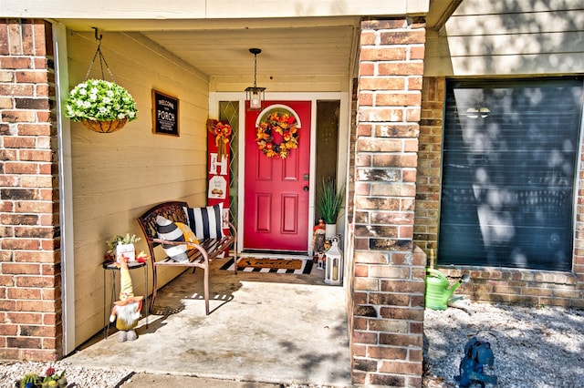 property entrance featuring covered porch