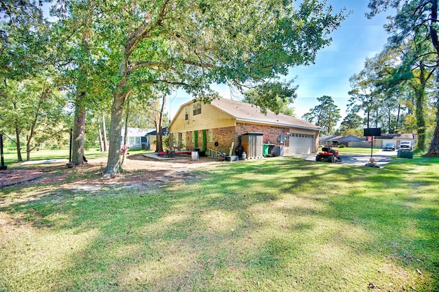 view of yard with a garage