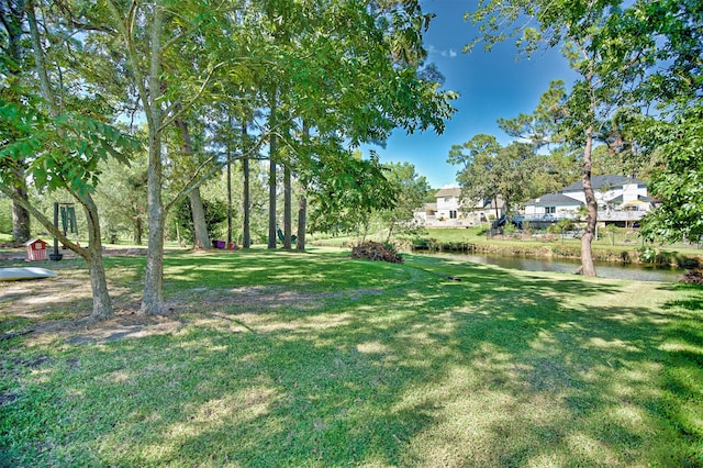 view of yard with a water view