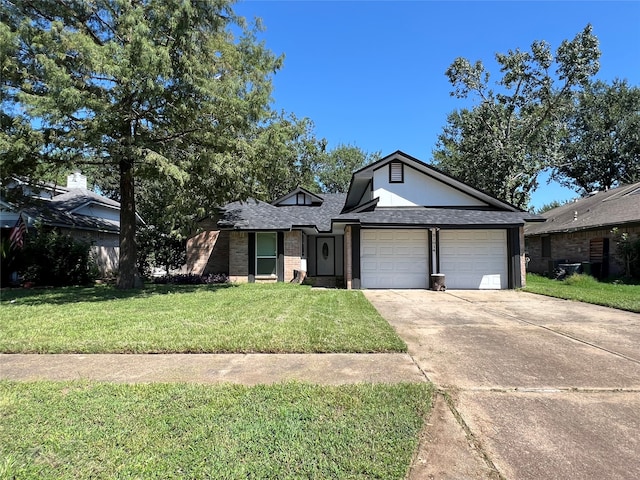 view of front facade featuring a front yard and a garage